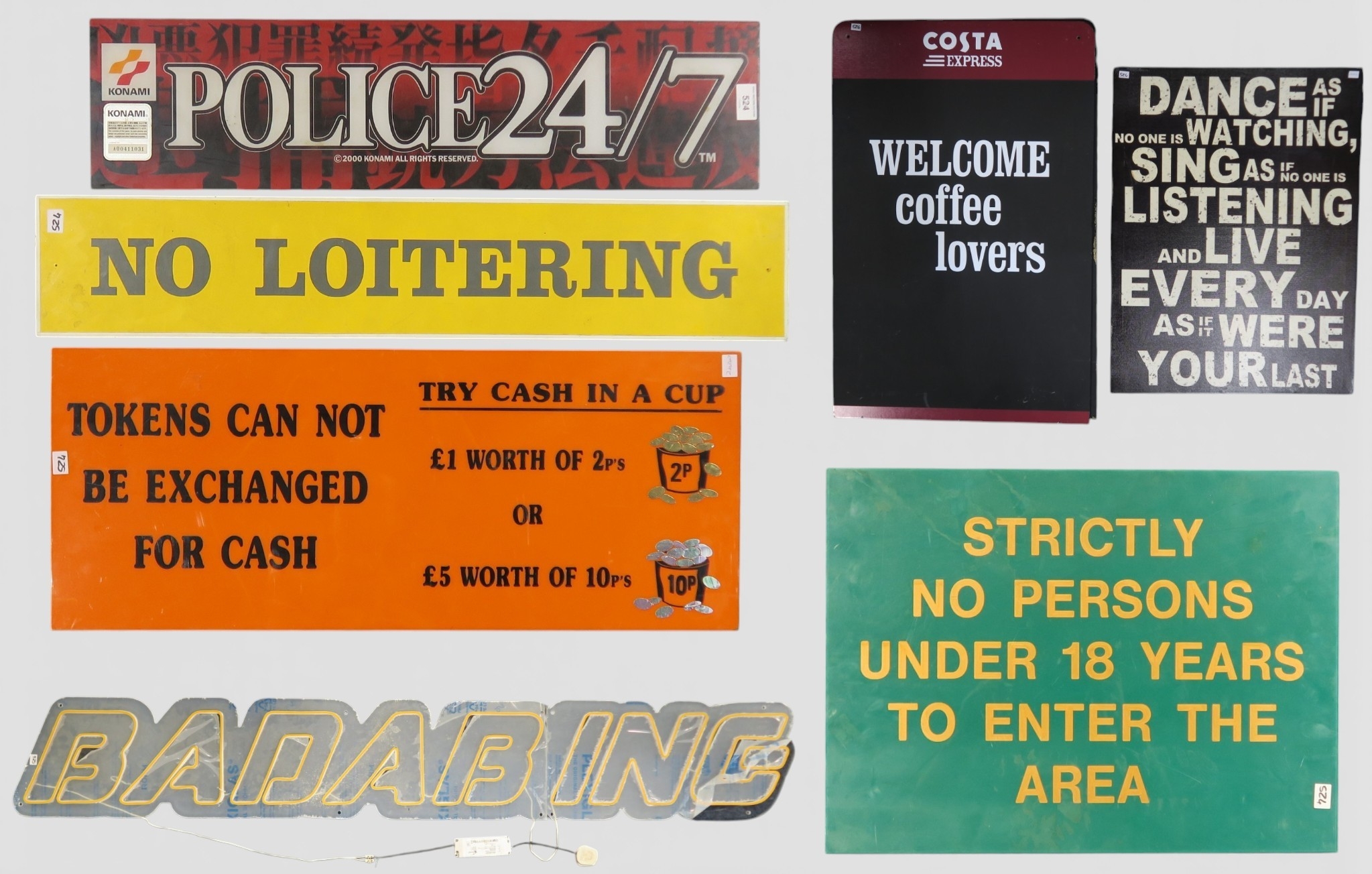 Assorted commercial public notices/signage, including an oblong 