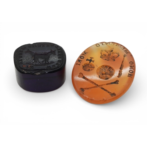 2721 - MEMENTO MORI WITH A SCOTTISH THEMEthe carnelian is intaglio carved with skull and crossed bones, and... 