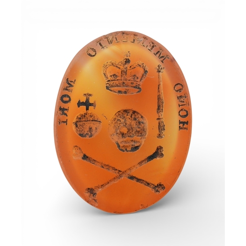 2721 - MEMENTO MORI WITH A SCOTTISH THEMEthe carnelian is intaglio carved with skull and crossed bones, and... 