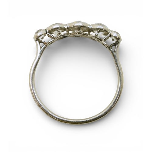2722 - A FIVE STONE DIAMOND RINGset with five old cut diamonds, in a delicate bright white metal  mill-grai... 