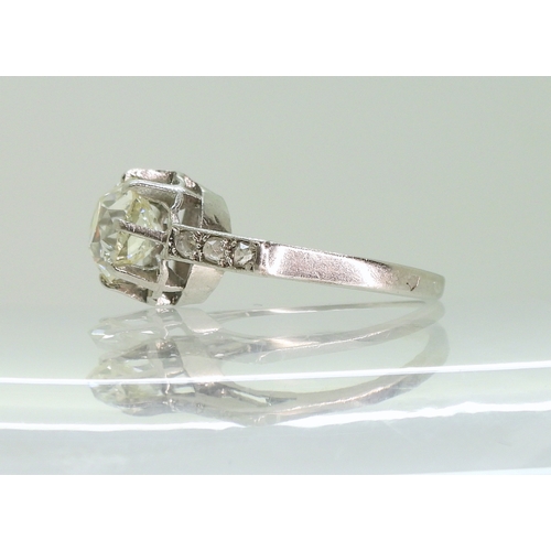 2724 - A SUBSTANTIAL DIAMOND RINGthe white metal shank is set with a cushion cut diamond of estimated appro... 