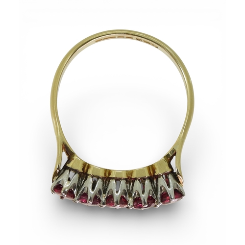 2726 - A RUBY ETERNITY RINGwith a yellow and white 18ct gold mount, set with five rubies each approx 3.5mm.... 