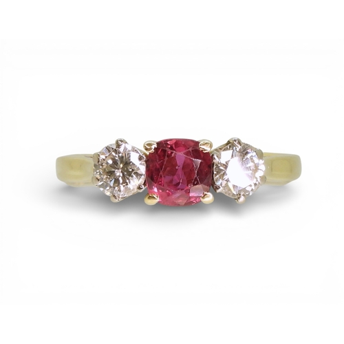2727 - A RUBY AND DIAMOND RINGin 18ct yellow and white gold, set with a cushion cut ruby of approx 5.4mm x ... 
