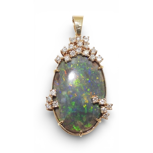 2731 - AN OPAL & DIAMOND PENDANTmounted in 18ct gold, the substantial opal of approx 30mm x 18mm x 6.8m... 