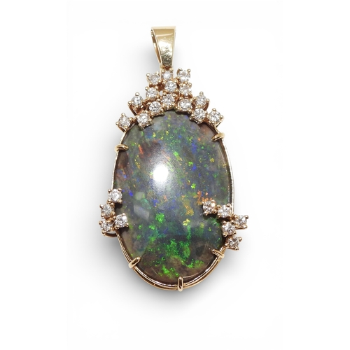 2731 - AN OPAL & DIAMOND PENDANTmounted in 18ct gold, the substantial opal of approx 30mm x 18mm x 6.8m... 