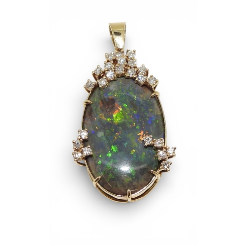 2731 - AN OPAL & DIAMOND PENDANTmounted in 18ct gold, the substantial opal of approx 30mm x 18mm x 6.8m... 