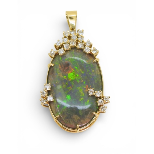 2731 - AN OPAL & DIAMOND PENDANTmounted in 18ct gold, the substantial opal of approx 30mm x 18mm x 6.8m... 