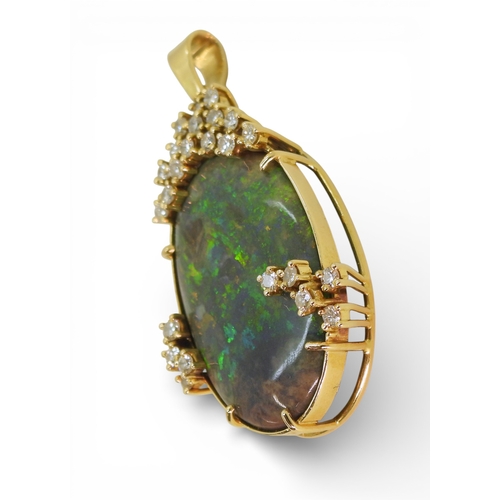 2731 - AN OPAL & DIAMOND PENDANTmounted in 18ct gold, the substantial opal of approx 30mm x 18mm x 6.8m... 