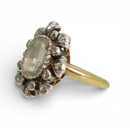 2732 - A SUBSTANTIAL DIAMOND RINGset with a large shallow old mine cut diamond of estimated approx 10mm x 8... 