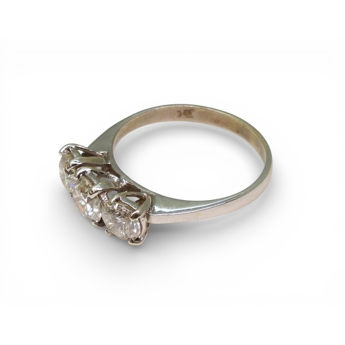 2736 - A THREE STONE DIAMOND RINGthe mount in 9ct white gold and set with three brilliant cut diamonds with... 
