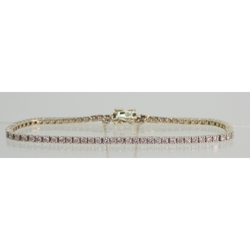2737 - A DIAMOND LINE BRACELETthe mount in 18k white gold and set with estimated approx 2.28cts of brillian... 