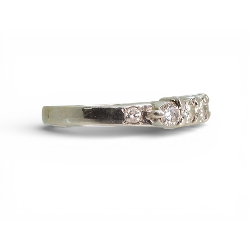 2739 - A SIX STONE DIAMOND RINGthe white metal mount, set with estimated approx 0.78cts of brilliant cut di... 