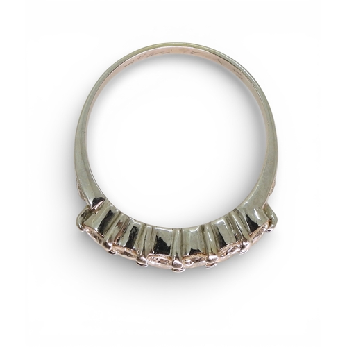 2739 - A SIX STONE DIAMOND RINGthe white metal mount, set with estimated approx 0.78cts of brilliant cut di... 