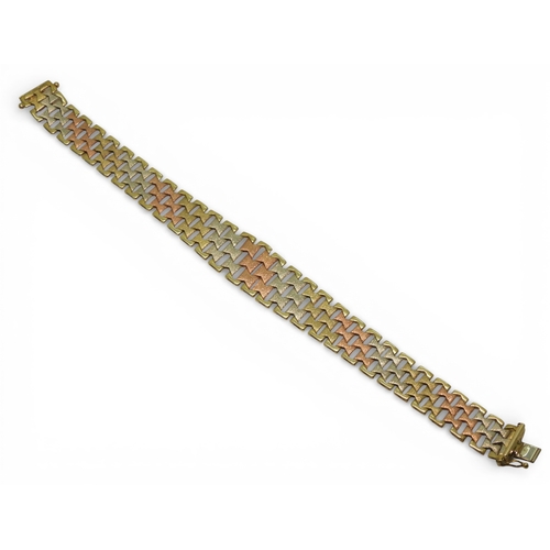 2741 - AN ITALIAN MADE 9CT GOLD TRICOLOUR BRACELETof double tapered form with bark textured links. Length19... 