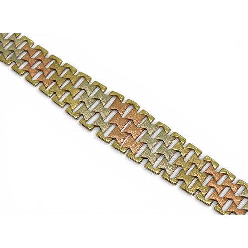 2741 - AN ITALIAN MADE 9CT GOLD TRICOLOUR BRACELETof double tapered form with bark textured links. Length19... 
