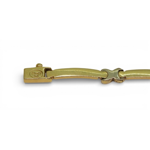 2745 - A DIAMOND FLOWER NECKLACEmade in 14k yellow and white gold with baton and kiss shaped links, with a ... 