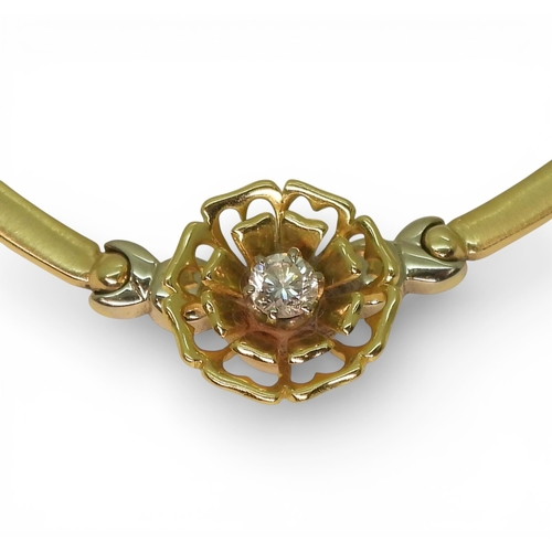 2745 - A DIAMOND FLOWER NECKLACEmade in 14k yellow and white gold with baton and kiss shaped links, with a ... 