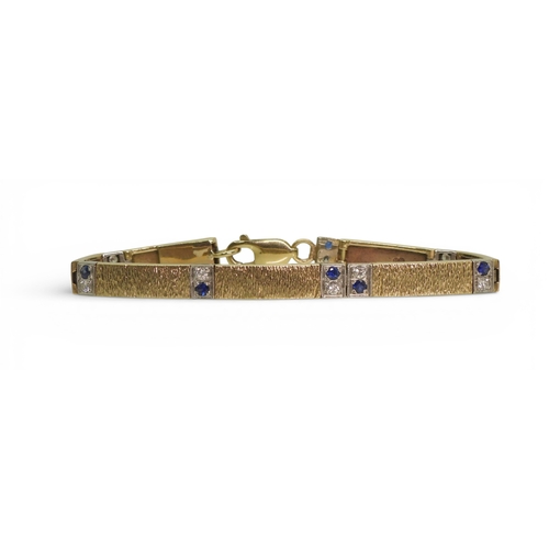 2746 - A 9CT GOLD SAPPHIRE & DIAMOND BRACELETmade by Alan Hodgkinson in Edinburgh, 1990, with bark text... 