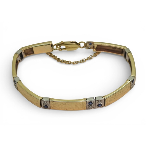 2746 - A 9CT GOLD SAPPHIRE & DIAMOND BRACELETmade by Alan Hodgkinson in Edinburgh, 1990, with bark text... 