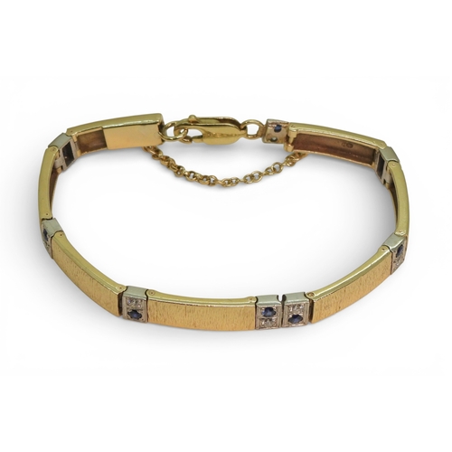2746 - A 9CT GOLD SAPPHIRE & DIAMOND BRACELETmade by Alan Hodgkinson in Edinburgh, 1990, with bark text... 