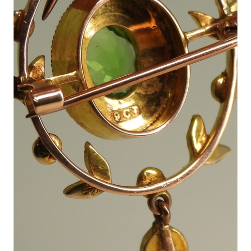 2747 - AN EDWARDIAN PENDANT BROOCHmade in 9ct gold set with a green gem and seed pearls, length with bail, ... 