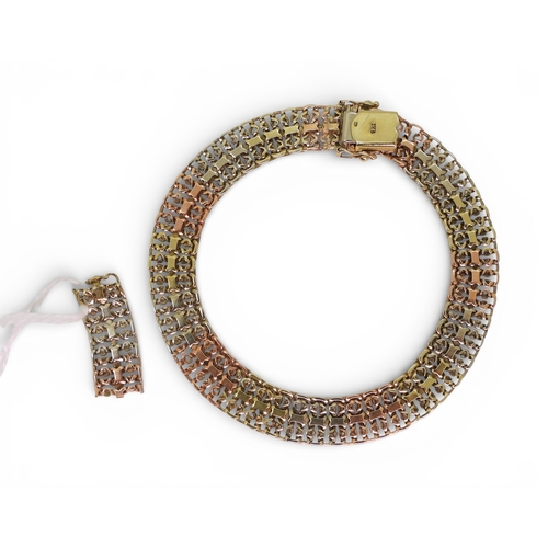 2750 - A 9CT TRICOLOUR GOLD BRACELETwith fancy lacey links, length 19.3cm, with box clasp and two safety cl... 