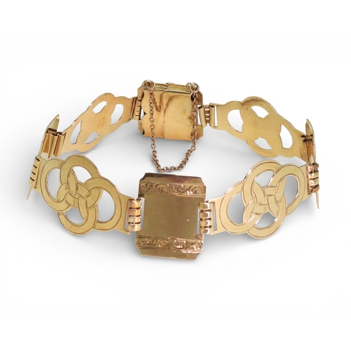 2752 - A FANCY LINK BRACELETmade in 9ct gold by Henry Griffith & Sons Ltd, circa 1952. the wide links o... 