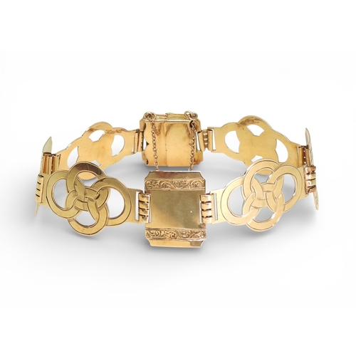 2752 - A FANCY LINK BRACELETmade in 9ct gold by Henry Griffith & Sons Ltd, circa 1952. the wide links o... 