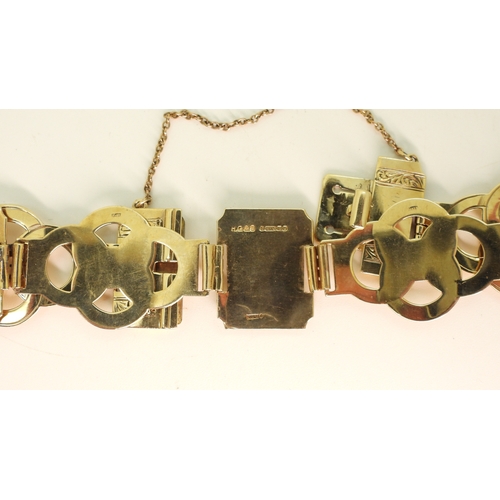 2752 - A FANCY LINK BRACELETmade in 9ct gold by Henry Griffith & Sons Ltd, circa 1952. the wide links o... 