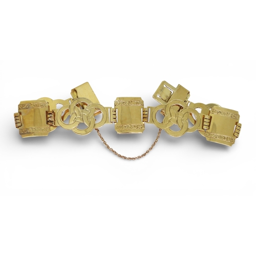2752 - A FANCY LINK BRACELETmade in 9ct gold by Henry Griffith & Sons Ltd, circa 1952. the wide links o... 