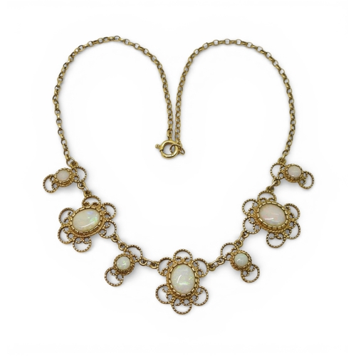 2758 - A WHITE OPAL NECKLACEmade by Bohemian Jewellery London (BJLd) in 1978. The 9ct gold filigree mounts ... 
