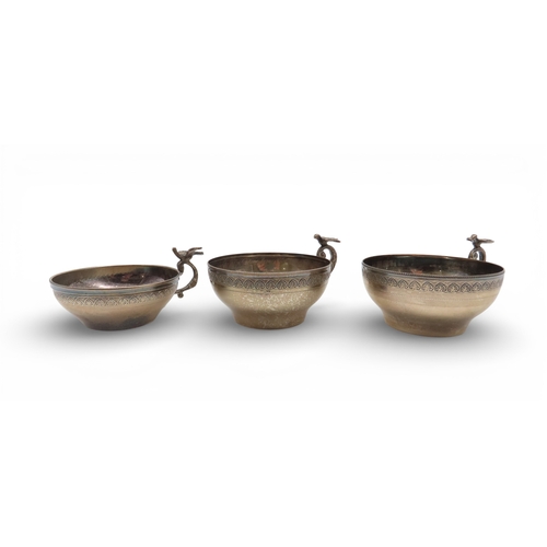 913 - Three 900 standard silver cups, with bird-capped handles, 136gms (3)
