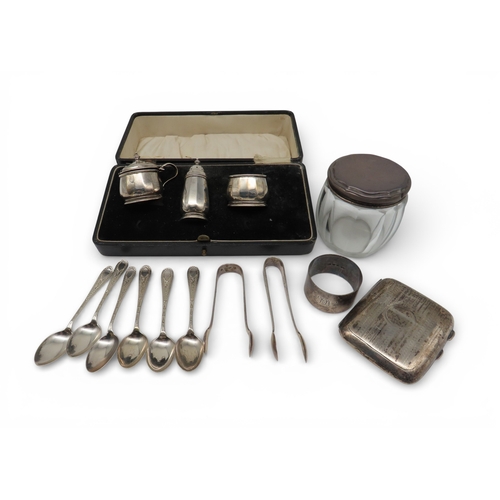 921 - A three piece silver cruet set, by Adie Brothers, Birmingham 1928, a silver cigarette case, Birmingh... 