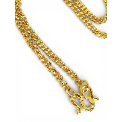 702 - A bright yellow metal curb chain, with Chinese symbols to the clasp, length 46cm, weight 11.3gms