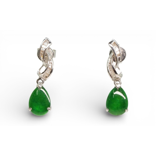 703 - A pair of 18ct white gold diamond and green gem earrings, length 2cm, weight 2.1gms