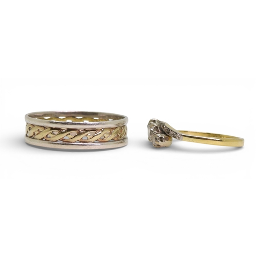 704 - A vintage 18ct gold three stone diamond ring, size O, weight 2.2gms and a silver and 9ct gold weddin... 