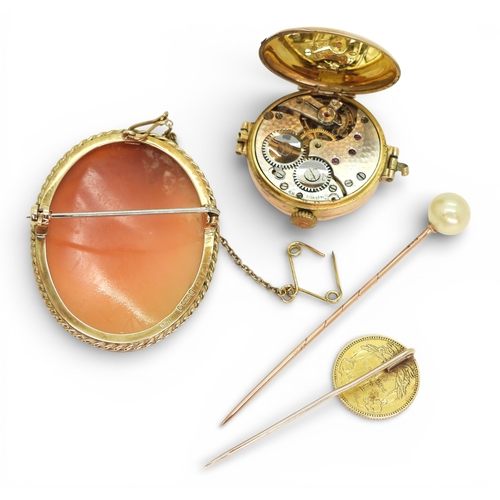 705 - An American 1 Dollar coin made into a lapel pin, weight 2gms, a 9ct cameo brooch and watch head, and... 
