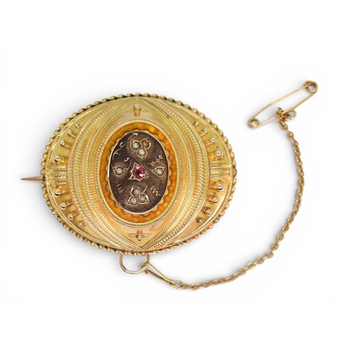706 - A Victorian yellow metal balloon brooch, with plaited hair under glazed panel, weight 13.6gms