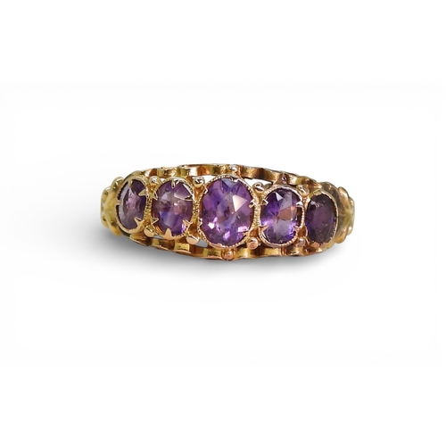 710 - A bright yellow Victorian style amethyst ring,size M, weight 1.8gms