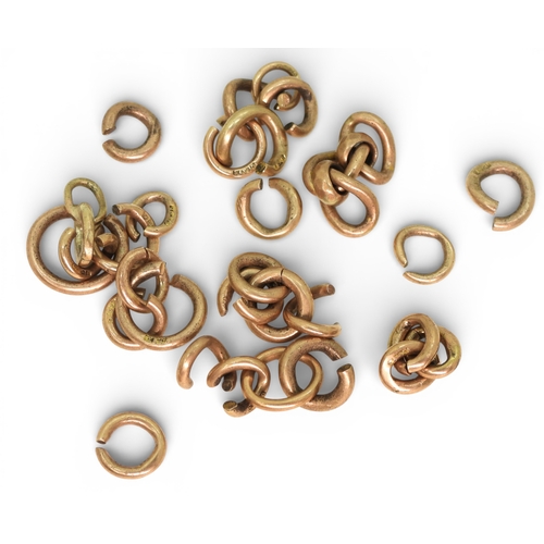 711 - A bag of 9ct hallmarked and yellow metal jump rings, weight 13.5gms