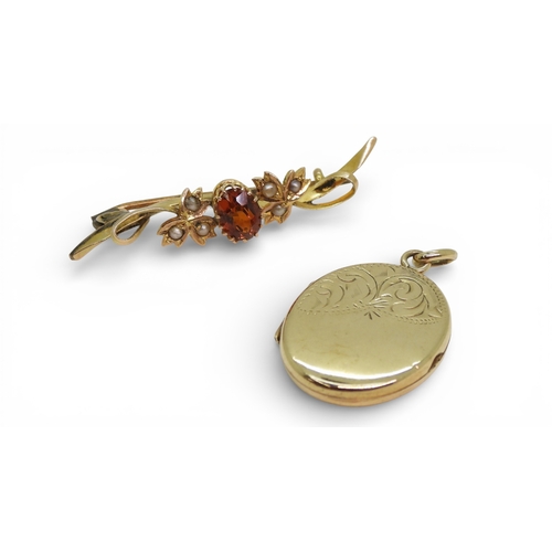712 - A 9ct gold locket and a 9ct gold citrine and pearl brooch, weight combined 5.3gms