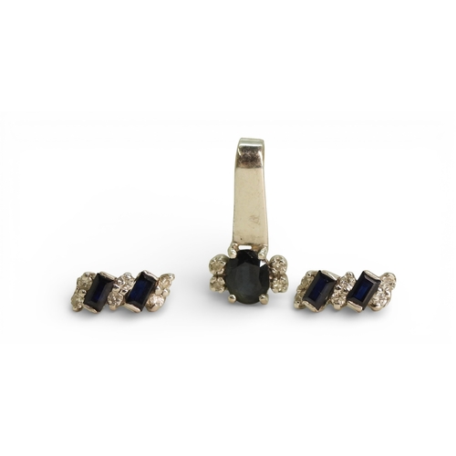 715 - A 9ct white gold sapphire and diamond pendant and similar earrings, weight combined 2.5gms
