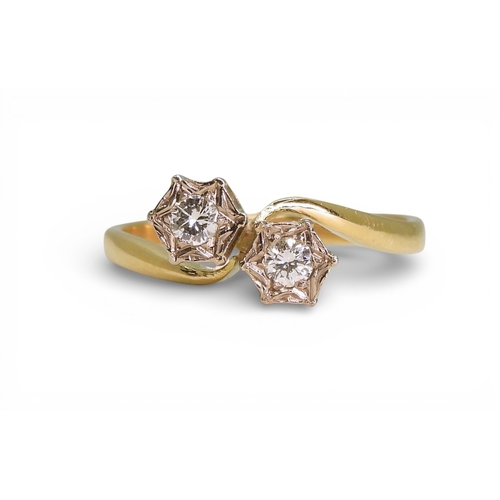 780 - An 18ct gold twin illusion set diamond ring, size O1/2, weight 3.1gms