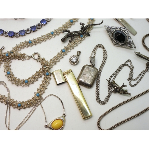 879 - A collection of silver and white metal jewellery to include bracelets set with lapis lazuli, and amb... 