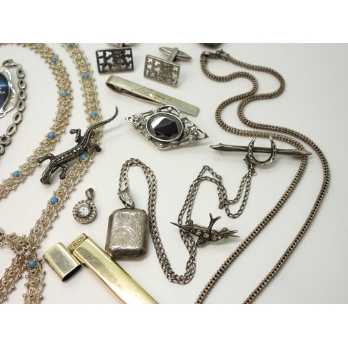 879 - A collection of silver and white metal jewellery to include bracelets set with lapis lazuli, and amb... 