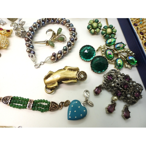 880 - A pearl bracelet with a silver clasp, and a collection of vintage and modern costume jewellery to in... 