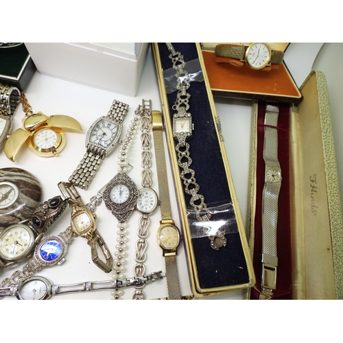 882 - A collection of watches to include Buler, Seiko, Ingersoll, Bentima, Bulova, a compass set into a ha... 
