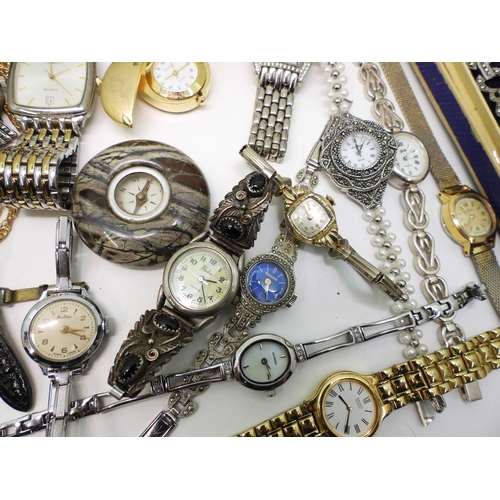 882 - A collection of watches to include Buler, Seiko, Ingersoll, Bentima, Bulova, a compass set into a ha... 
