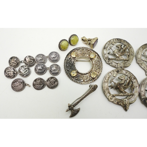 891 - A white metal Celtic knotwork brooch with zoomorphic design, set with citrines, a collection of simi... 
