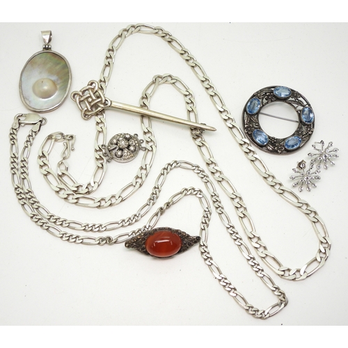 892 - A Bernard Instone style brooch, a Thomas Ebbutt, silver brooch, silver chains and other items